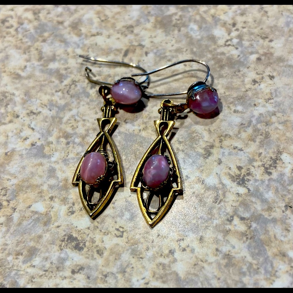 Vintage earrings- Gold tone with purple stones. Good condition.